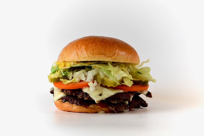 Photo of All American Double - Two crispy beef patties with American cheese, lettuce, tomato, pickles, and our special sauce